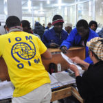 Migrants from Libya receive assistance from IOM